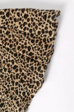 PRE-ORDER: Peekaboo Fuzzy Leopard Print Grommet Mini Skirt -TUNNEL Vision Shop 611A2073
