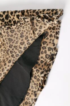 PRE-ORDER: Peekaboo Fuzzy Leopard Print Grommet Mini Skirt -TUNNEL Vision Shop 611A2074