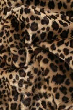 PRE-ORDER: Peekaboo Fuzzy Leopard Print Grommet Mini Skirt -TUNNEL Vision Shop 611A2078